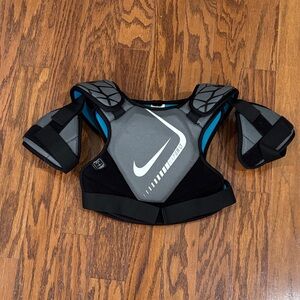 Lacrosse Nike Kids Gray and Black Protective Shoulder Pads with Blue Accents
